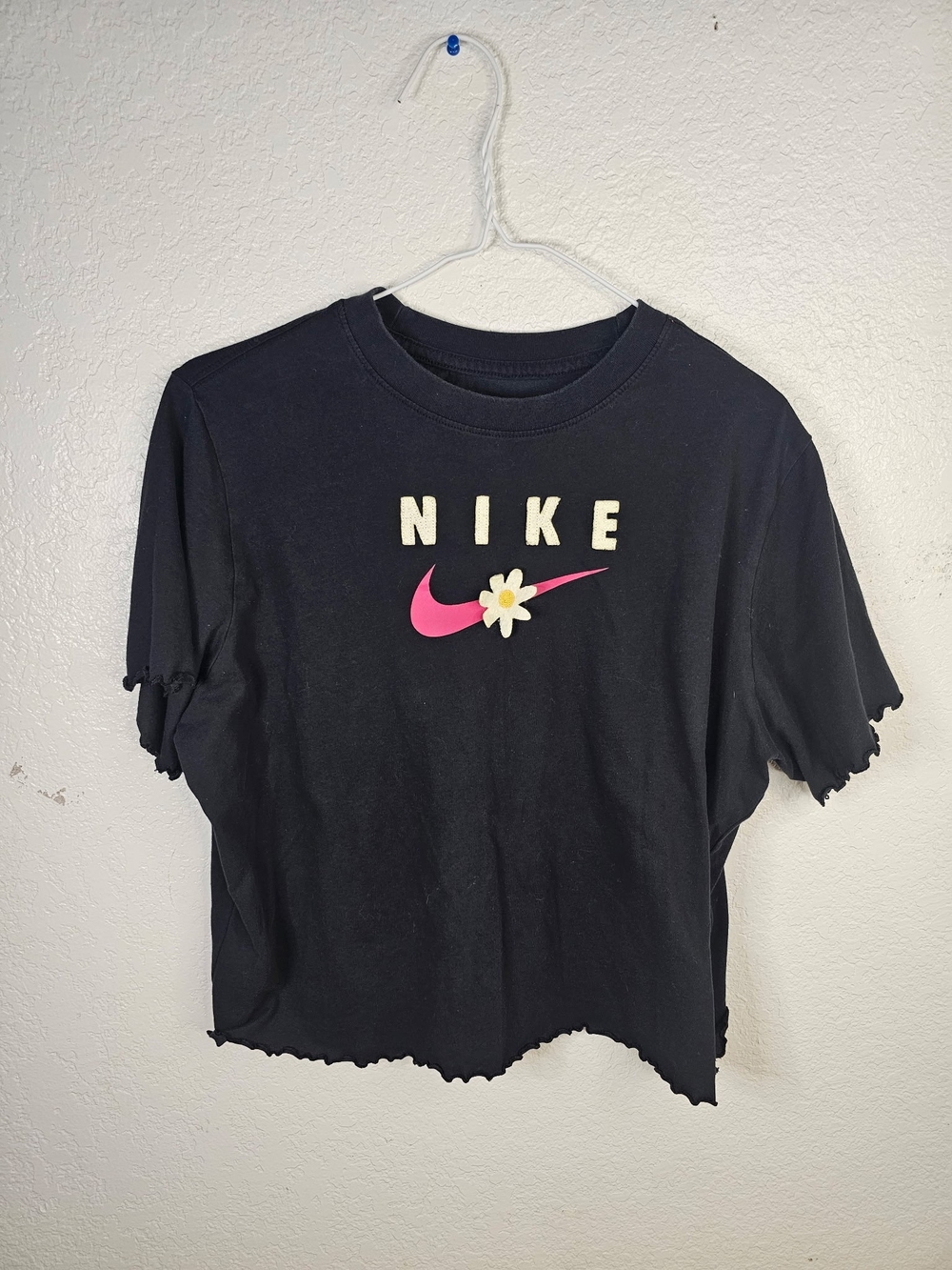 Nike Black Girls' Logo Tee with Pink Swoosh and Daisy